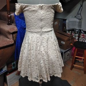 A short formal cream homecoming dress